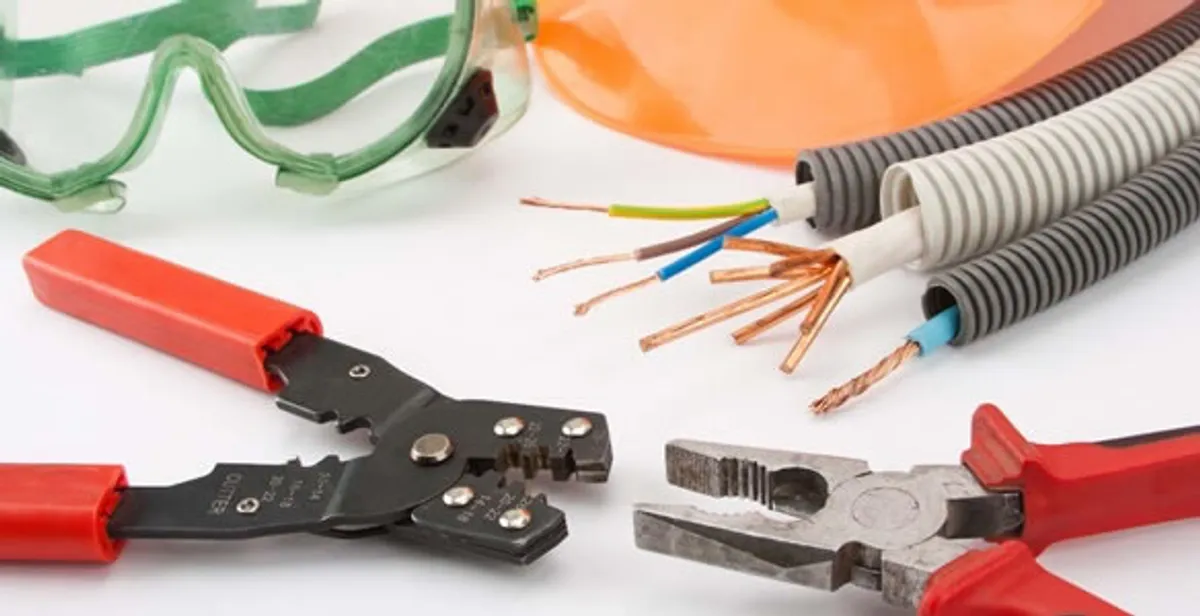 Electrical wiring repair with professional tools and safety equipment in Estero, FL