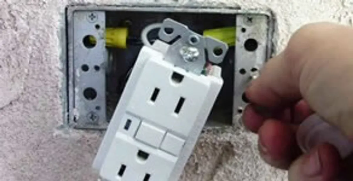 gfci circuits service showing installation of a ground fault circuit interrupter outlet by licensed electricians in Cape Coral, FL