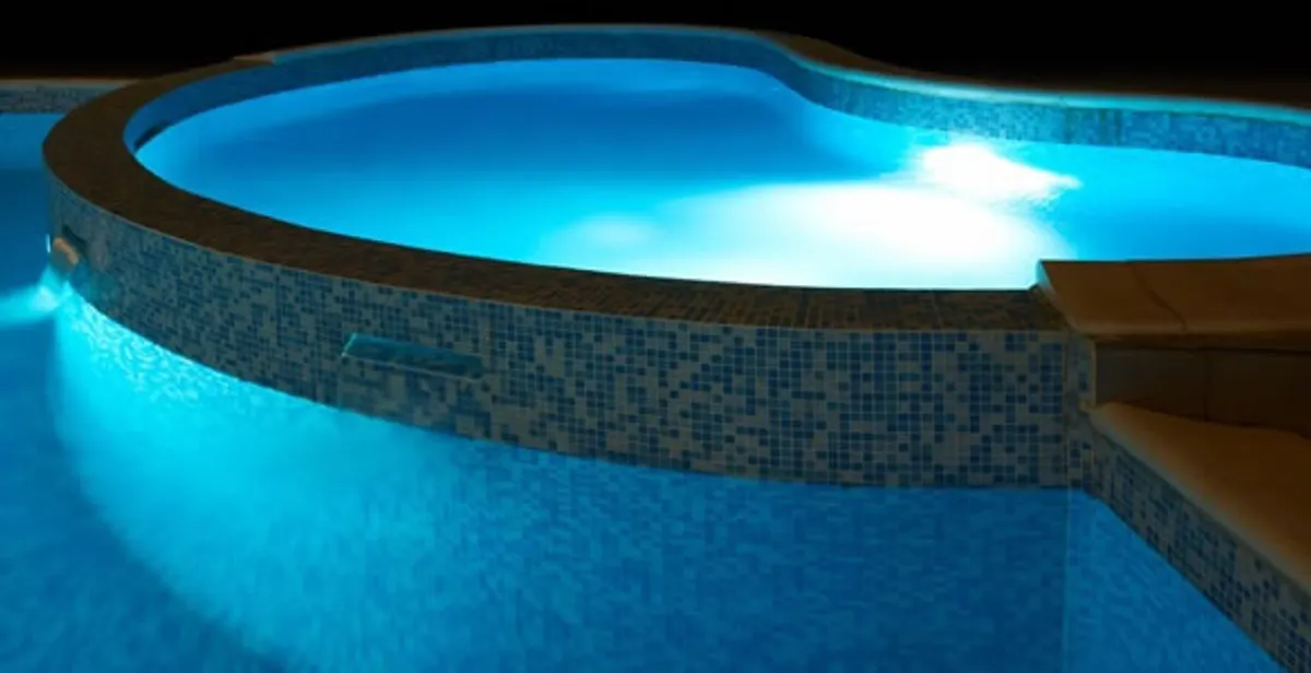 pool light installation and repair services highlighting illuminated pool interior lighting in Cape Coral, FL
