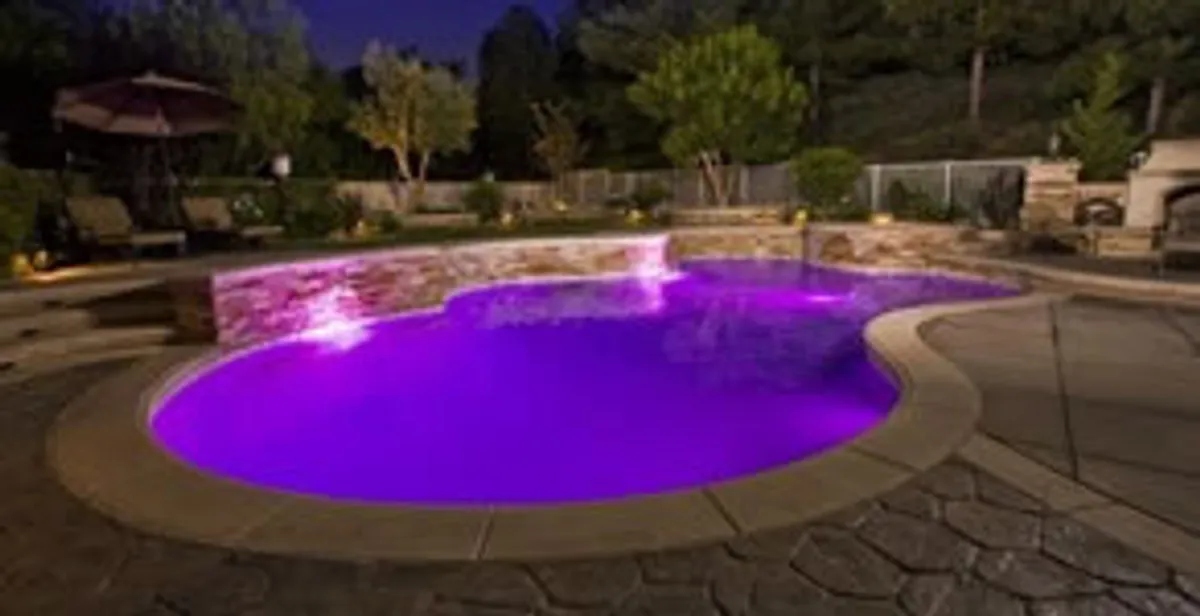 pool light installation and repair services illuminating a residential swimming pool in Cape Coral, FL