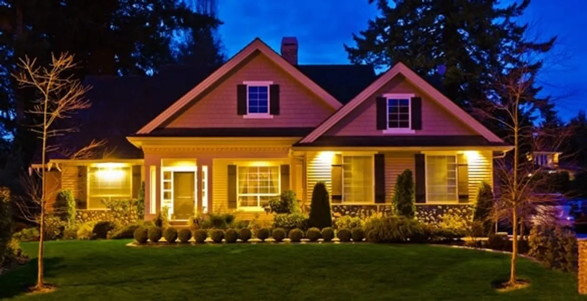 security light installation services illuminating a residential exterior at night in Cape Coral, FL
